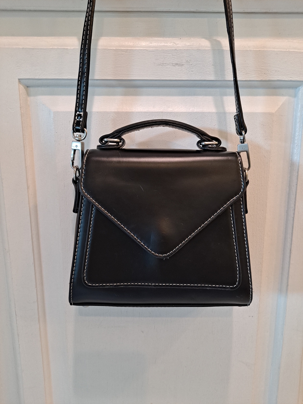 Urban Outfitters Kendall Mini Trapezoid  Smooth Black Vegan White Stitching Bag